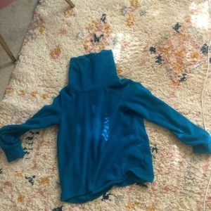 Teal turtleneck